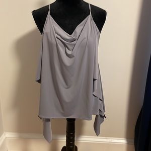 Two Express flowing tank size medium both NWT. 70 dollars new. Great bundle deal